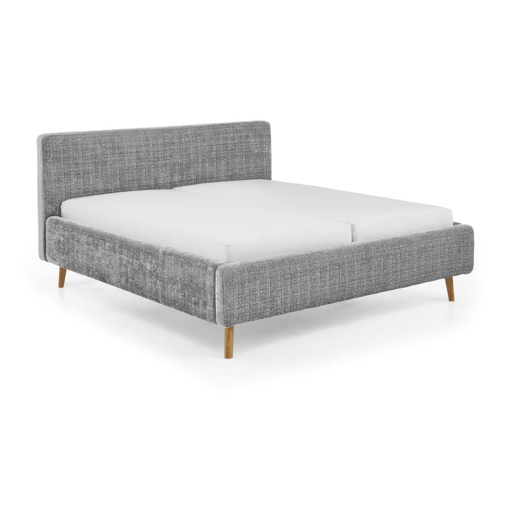 Světle šedá čalouněná dvoulůžková postel s roštem 180x200 cm Primavera – Meise Möbel